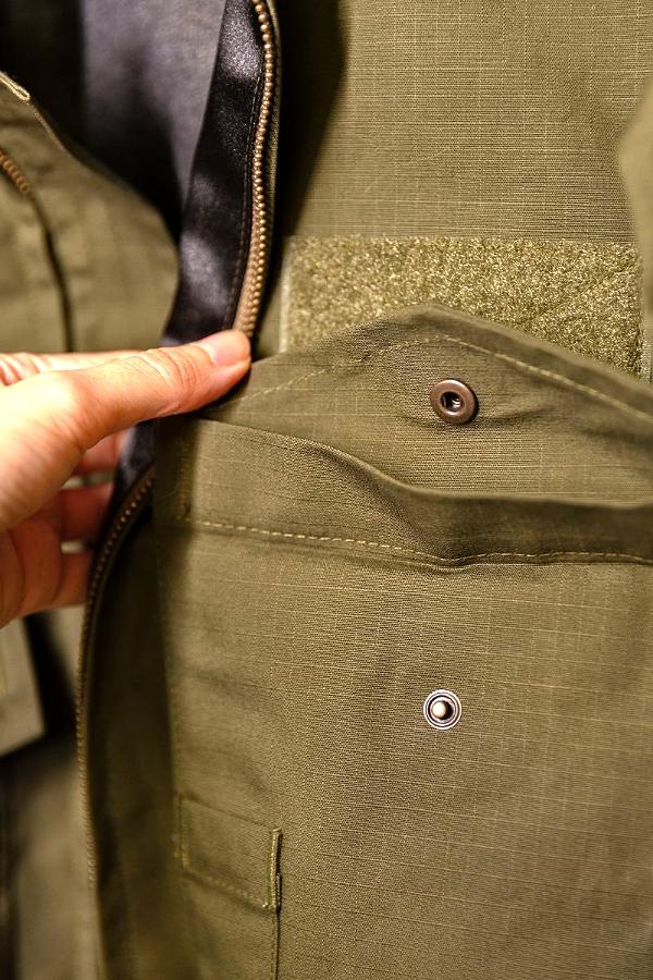 Détail d'une veste en cours de finition